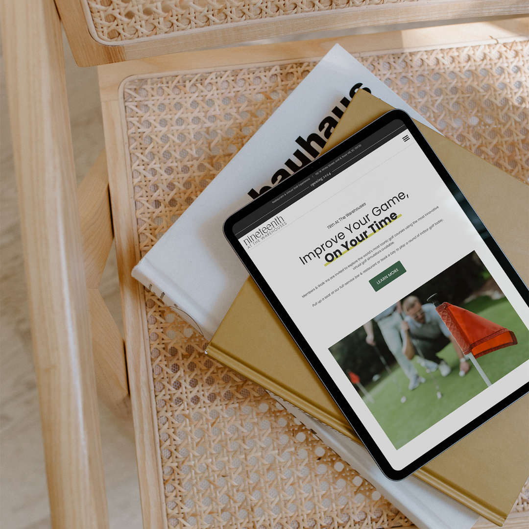 Tablet displaying the nineteenth at the warehouses website with the headline