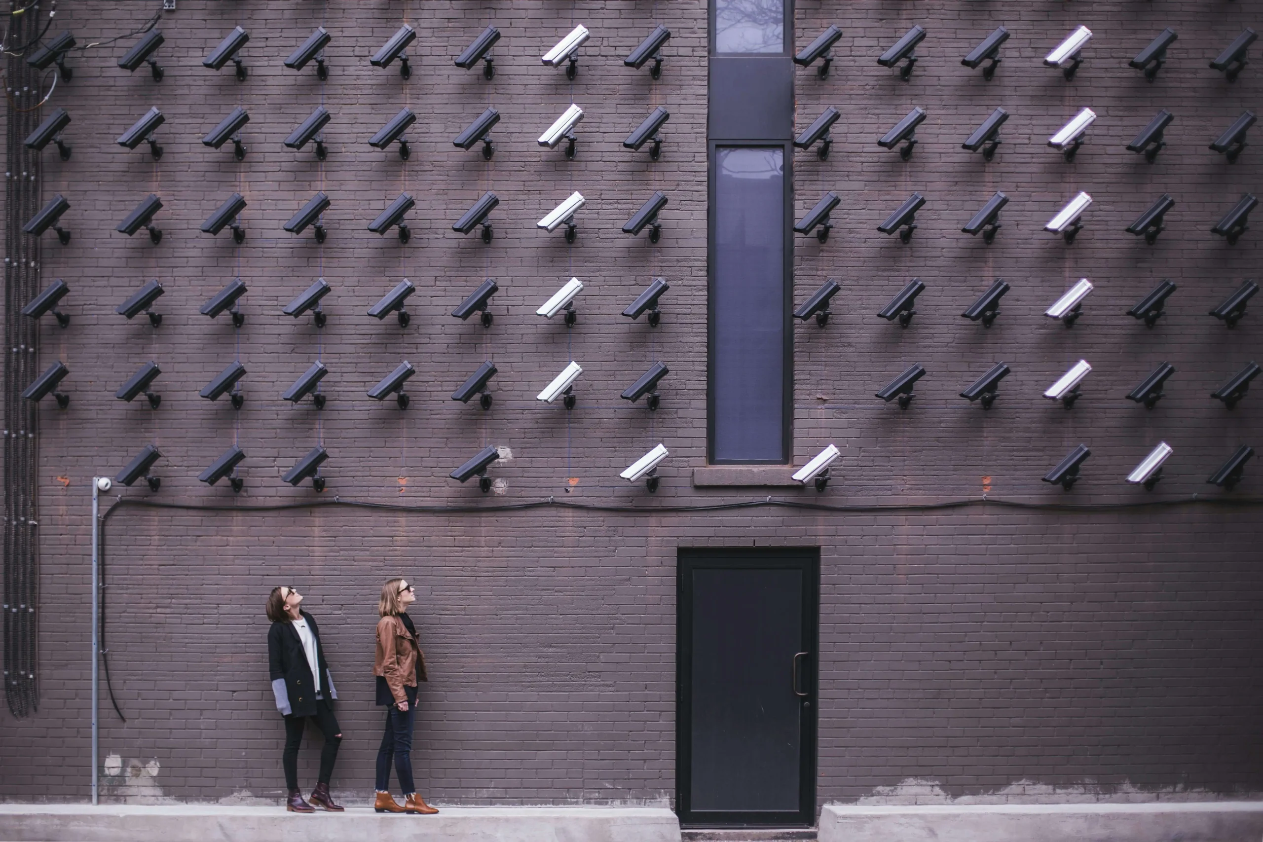privacy cameras watching couple on sidewalk - privacy policy - website privacy